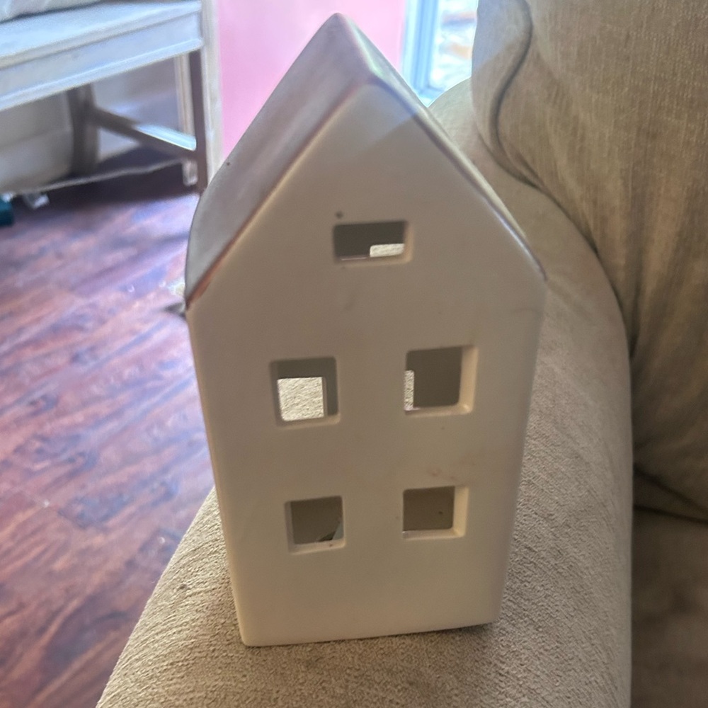 Ceremaic white lighted house
